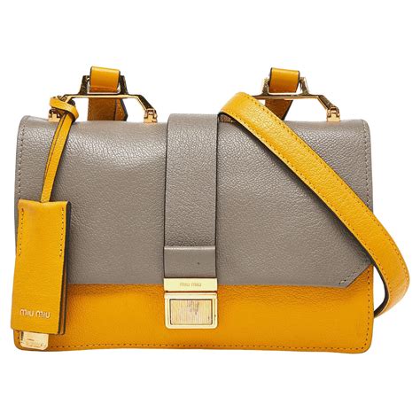 miu miu bandoliera madras crossbody|Miu Miu Mustard/Grey Madras Leather Bandoliera .